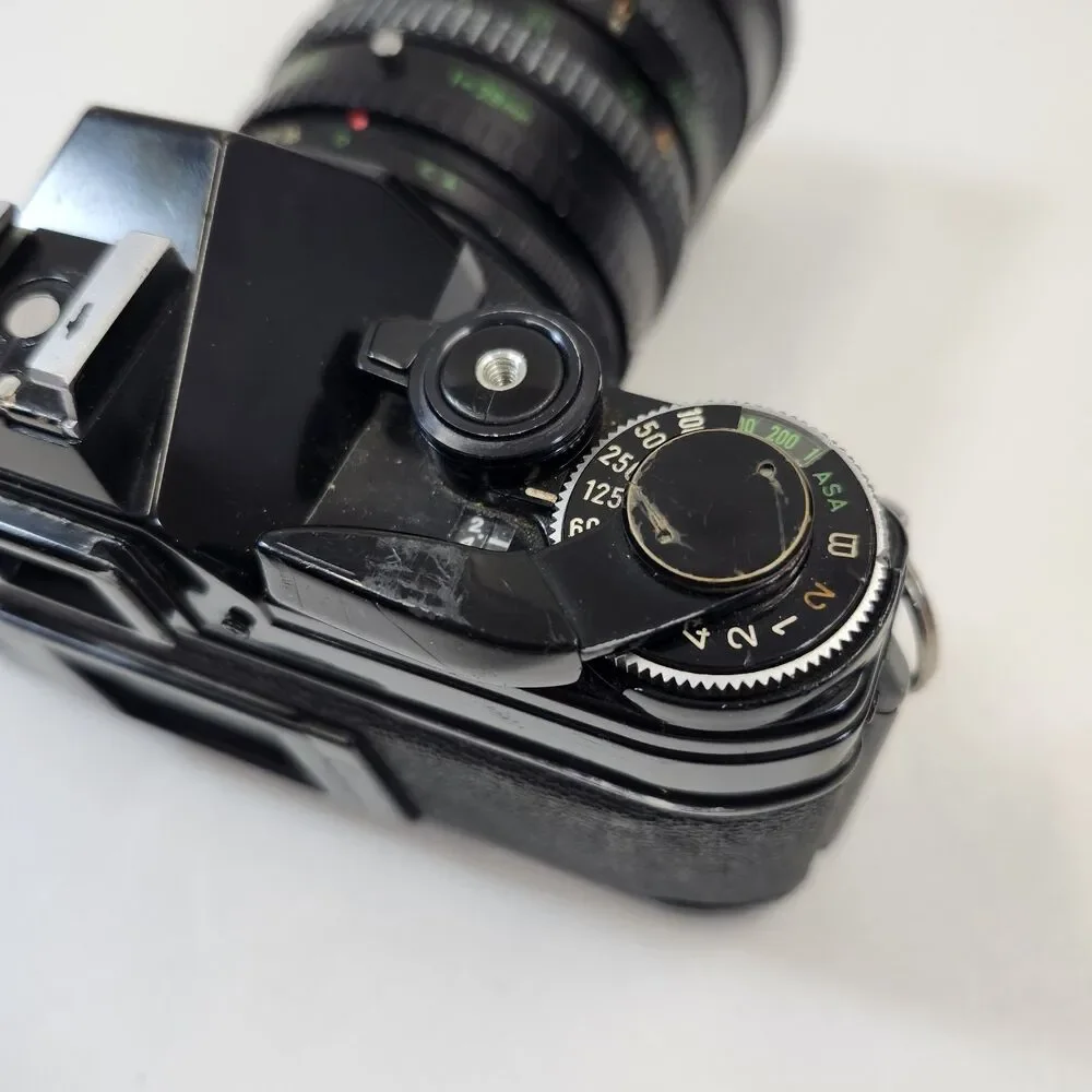 Canon AE-1 Black 35mm SLR Film Camera Sakar MC Zoom 1:3.5-4.5 f 28-80mm